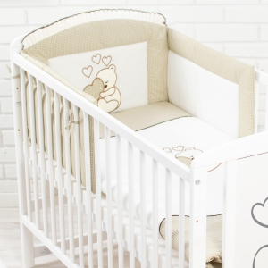 Ochraniacz do łóżeczka dziecięcego ciemno beżowy.