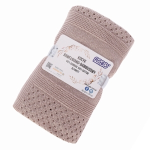 Decke elegant gefaltet und mit einem Band gebunden – bereit als Geschenk
